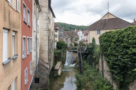 Cuissance River and its dam in the historical village of Arbois, Jura, Franceの写真素材