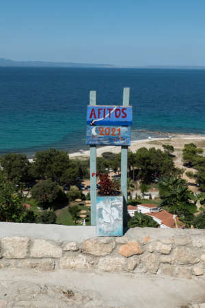 Afytos, Greece, July 9, 2021: Situated on top of a hill, the village of Afitos, or Athitos, features stone houses and cobbled streets.のeditorial素材