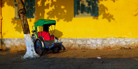 tricycle in the streets of hoi an Vietnam