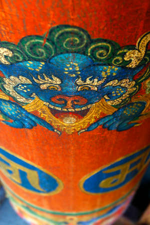 Prayer wheel in Tibetan monastery