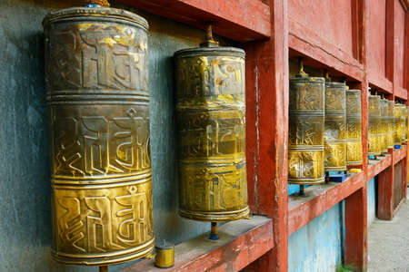 Prayer wheel in buddhist monastery