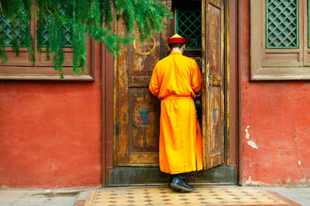 monk coming in buddhist monastery in Mongoliaのeditorial素材