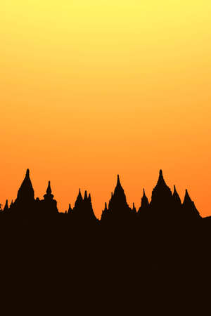 Sunset in buddhist temple, stupa, in the historical park of Bagan, Myanmarの写真素材