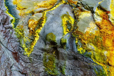 SULFUR ON ROCK ON KAWAH IJEN VOLCANO IN JAVA ISLAND-INDONESIAの写真素材