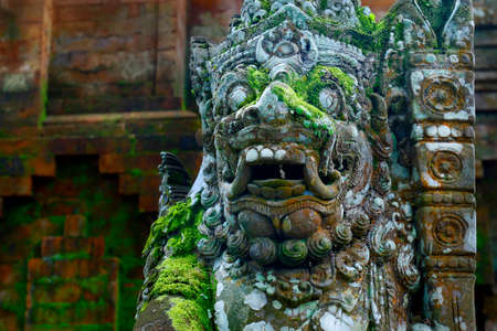 Stone carved statue of Barong in Hindu temple in Bali-Indonesiaの写真素材