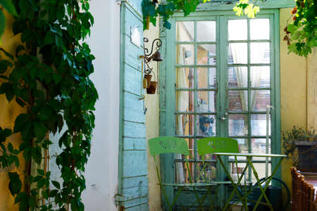 facade of mediterranean building with colorful shutter