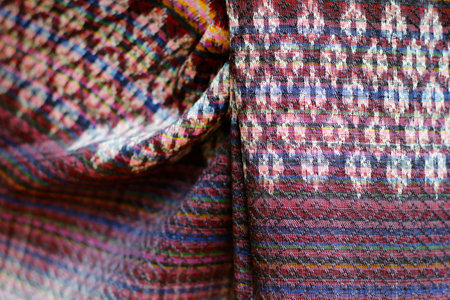 detail of ethnic waved silk dress