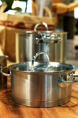 assortment of kitchen utensil on a wooden tableの写真素材