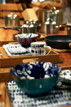 assortment of kitchen utensil on a wooden tableの写真素材