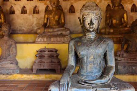 Ancient statue of buddha in Si Saket temple at Vientiane-Laosの写真素材