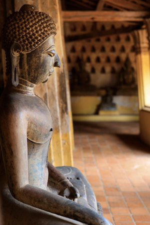 Ancient statue of buddha in Si Saket temple at Vientiane-Laosの写真素材