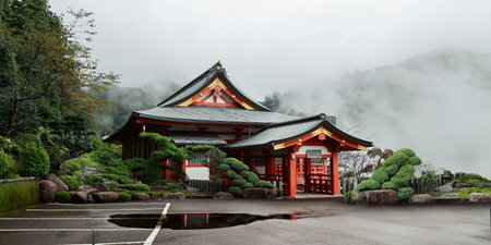 view of Japanese temple during autumn season in misty mountainsの写真素材