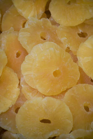 Plenty of sweet dried pineapples on the farmers marketの写真素材
