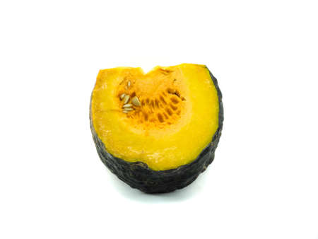 a quarter pumpkin isolated on the white backgroundの写真素材