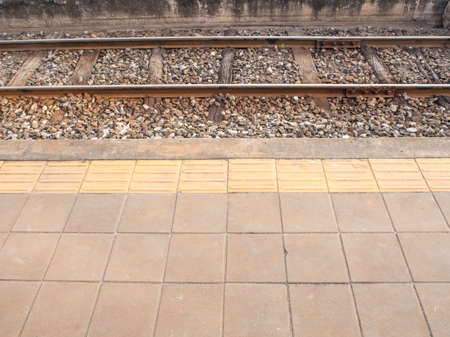 pavement and braille block of platform of railways stationの写真素材