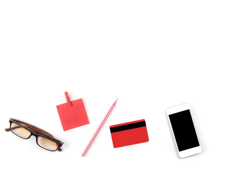 Minimal and Modern white office desk credit card and glasses and other supplies, Top view with space...