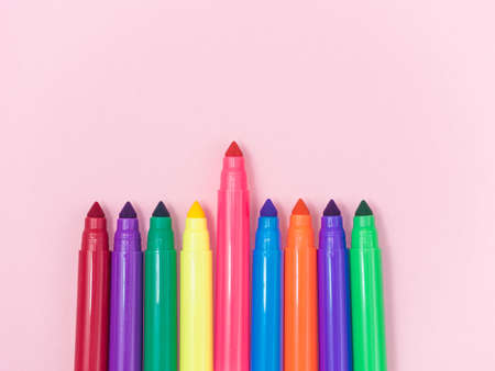 Colorful magic pen, pink is number one on pink background, minimal concept and similarities differencesの写真素材