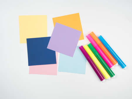 Note all colorful paper and magic pen, post memo papers isolated on white backgroundの写真素材