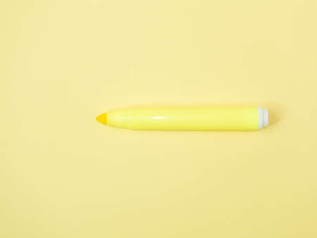 yellow magic pen on yellow background, minimal concept and similarities differencesの写真素材