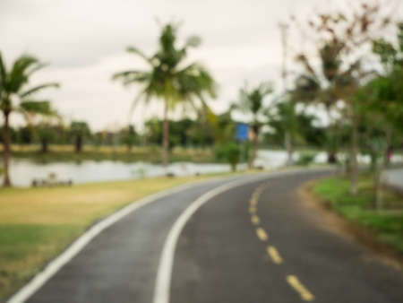 blur the way empty in the park with tree for exercise and relaxの写真素材