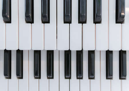 Top view and close up of a piano keyboard