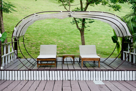 Lounge chairs on inviting deckの写真素材
