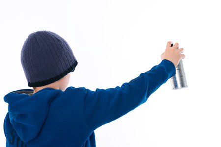 boy with aerosol can