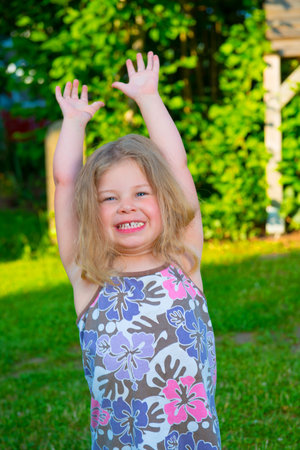 happy girl in the gardenの写真素材
