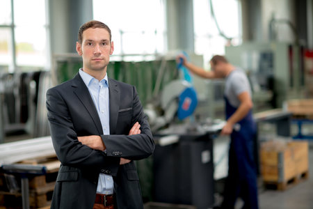 young boss in his factory young boss in his factory