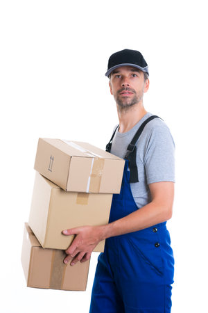 friendly postman with parcels in front of white background