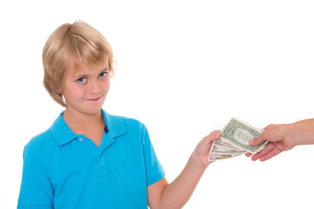 blond boy preserve his pocket money - dollarsの写真素材