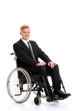 portrait of a young businessman in a wheelchairの写真素材