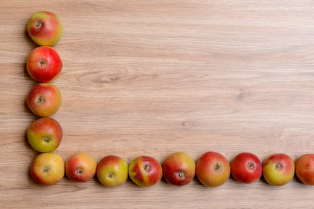 umpteen apples on wooden ground from aboveの写真素材