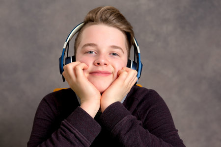teenager with headphone listening music