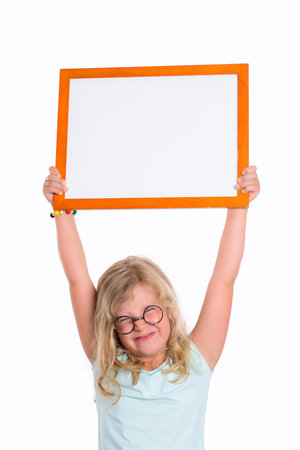 little funny girl with round glasses showing white signの写真素材