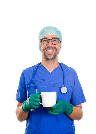 young doctor with coffee cup in front of white backgroundの写真素材