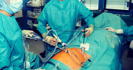 Surgeons working on a patient in a operating theater の写真素材