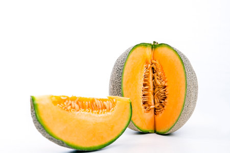 fresh sweet cantaloupe melon on white groundの写真素材