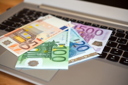 still life- computer keyboard with euro bank notesの写真素材