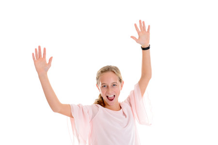 happy girl with blond hair and bright shirt in front of white backgroundの写真素材