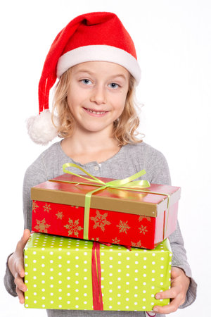 nice girl with Santa- cap and presentの写真素材