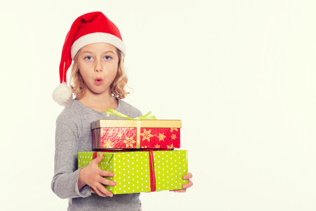 nice girl with Santa- cap and presentの写真素材