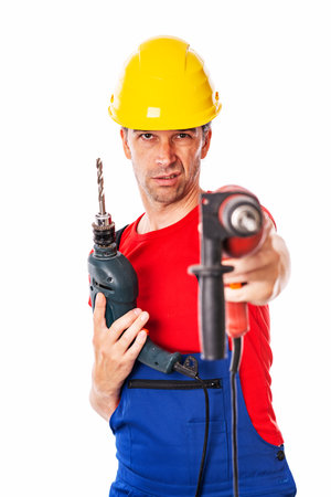wild man with helmet and two drilling machineの写真素材