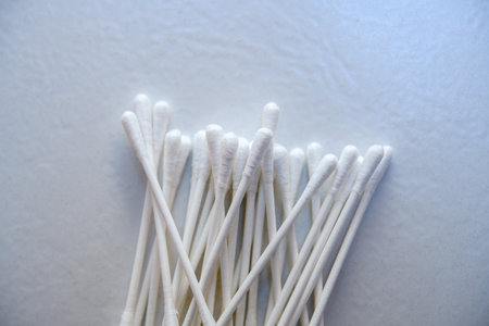 white cotton buds on bright groundの写真素材