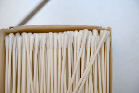 white cotton buds in cardboard boxの写真素材