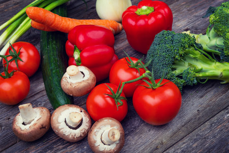 different vegetables on wooden groundの写真素材