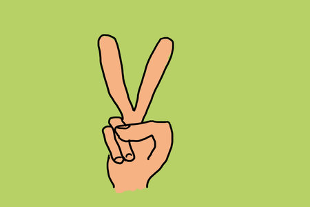 illustration of a hand with victory sign on green groundの写真素材