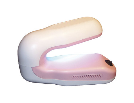 UV Lamp for Nail Curing on White Backgroundの写真素材
