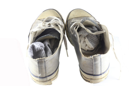 old sneakers on white background  の写真素材