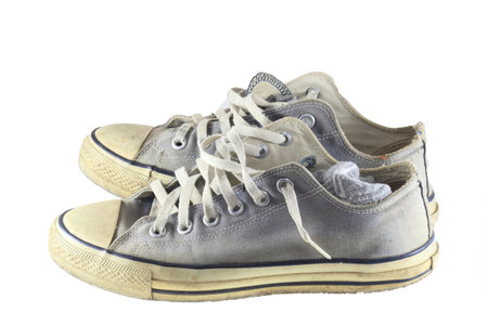 old sneakers on white background  の写真素材